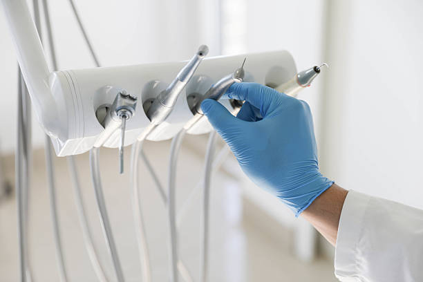 Professional Invisalign Clear Aligners technician working in Highland, IL